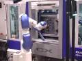 Motoman robots machine tending