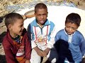 Three little boys reciting surat ad-duha