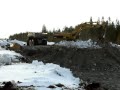 Cat 385CL Loading Articulated Dumpers