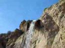 Rapelling down a waterfall