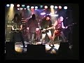kidstuff at a mid 90's reunion show doing a cover of jackyl's redneck punk with a low key terry helton playing guitar off to the side.