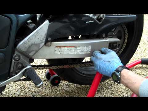 how to adjust a chain on a motorcycle