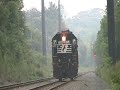 The single Unit creeps by to come to a stop at 302E and finally gets the yellow to proceed