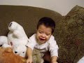 Yishai playing with his bears