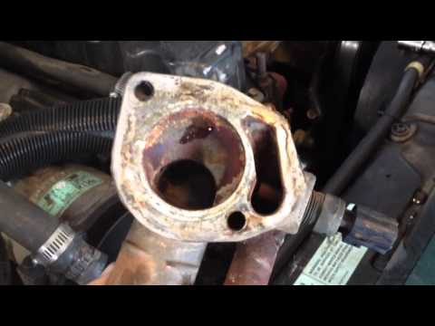 How to replace a thermostat on a 2000 jeep Cherokee sport 4×4