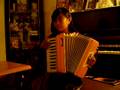 Jenn playing accordion