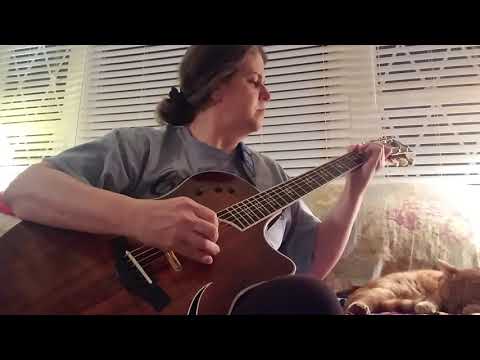 You'll Never Walk Alone an original fingerstyle guitar arrangement by Nina Cole.