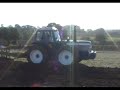 County 1884 Tractor using an 8 Furrow Reversible Plough County 1884 Tractor using an 8 Furrow Reversible Plough
