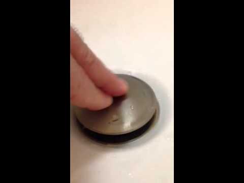 how to open kohler bathtub drain