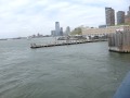 me and my friend are on the staten island ferry as it pulls out of manhattan. yay! you can here the ferry's horn!! we got yelled at for sticking our heads out the window...lol
