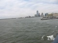 me and my friend are on the staten island ferry as it pulls out of manhattan. yay! you can here the ferry's horn!! we got yelled at for sticking our heads out the window...lol