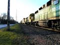 Eastbound stacker flies by with 3 Geeps - BNSF 1536 (GP28M), BNSF 1366 (GP7), and BNSF 2538 GP35u - and the engineer does a crossing sequence for me with that sweet horn.