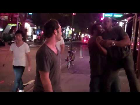 3 guys on the street out front of the Comedy Cellar reenacting Rocky 1-6