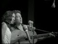 joan baez & bob dylan - with god on our side 1963 live

oh my name it is nothin'
my age it means less
the country i come from
is called the midwest
i's taught and brought up there
the laws to abide
and that land that i live in
has god on its side.

oh the history books tell it
they tell it so well
the cavalries charged
the indians fell
the cavalries charged
the indians died
oh the country was young
with god on its side.

oh the spanish-american
war had its day
and the civil war too
was soon laid away
and the names of the heroes
i's made to memorize
with guns in their hands
and god on their side.

oh the first world war, boys
it came and it went
the reason for fighting
i never did get
but i learned to accept it
accept it with pride
for you don't count the dead
when god's on your side.

in a many dark hour
i've been thinkin' about this
that jesus christ
was betrayed by a kiss
but i can't think for you
you'll have to decide
whether judas iscariot
had god on his side.

so now as i'm leavin'
i'm weary as hell
the confusion i'm feelin'
ain't no tongue can tell
the words fill my head
and fall to the floor
and if god's on our side
he'll stop the next war.