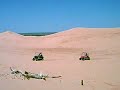 Golf carts climbing nice sized dune--Alpha Carts.com Golf carts climbing nice sized dune--Alpha Carts.com