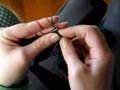 Holding 2 yarns in left hand for corrugated rib