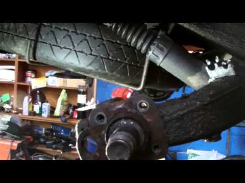 peugeot 206 axel repair.how to remove the rear arm part 2