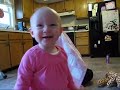 Evie plays with blanket