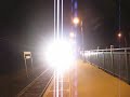 LIRR train heads west past Mastic-Shirley