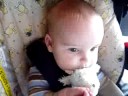 Jonathan eats his mini-giraffe