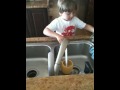 Daddy I am washing the dishes