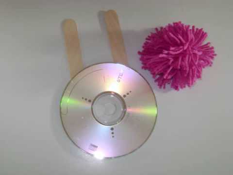 Recycler un CD en machine à faire des pompons