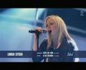 Linda performing Stay On These Roads