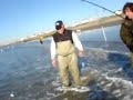 Brownie Troop catches Striped Bass with broken leg