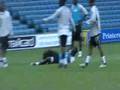 Michael Essien gets hit in training