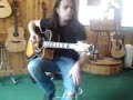 Me Testing an Expensive Takamine Guitar.