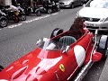 A cute Dog driving a Ferrari!