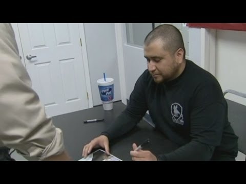 Trayvon Martin's killer signs autographs at Florida gun show