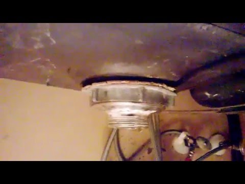 how to remove a stuck sink drain nut