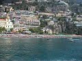 View of the gorgeous backdrop of Positano, Italy on the Amalfi Coast while sailing away.