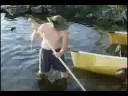 Man spearing fish