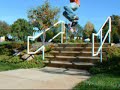 Skating At a church with sets, kickflip 5 and 6.