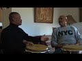 Tommy Lopez jams with former conga student, Chembo Corniel