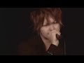 Roots of the King PV - TETRA-FANGLyrics:その手に浮かび上がる　紋章が証しsono te ni ukabi agaru monshou ga akashi闇の色を集め纏う　オーラのようにyami no iro o atsume matou oora (aura) no you niRoots of the king （×4）Roots of the king (×4)守られるべきものは　種族の掟mamorareru beki mono wa shuzoku no okite背く罪は瞬間　裁かれてsomuku tsumi wa shunkan sabakarete世界を滅ぼすという　力のためsekai o horobosu to iu chikara no tame現れた純血の継承者arawareta junketsu no keishoushaJudge it, King　紡がれてきた　運命のSagaJudge it, King　tsumugarete kita unmei no Sagaその腕にゆだねられたsono ude ni yudanerareta牙を剥いた者は　永遠に奈落を彷徨うkiba o muita mono wa eien ni naraku o samayouWhat is real?　圧倒的なWhat is real? attouteki na支配を今　大空に仕掛けてくるshihai o ima oozora ni shikakete kuru揺るぎない存在　Roots of the kingyuruginai sonzai Roots of the kingその椅子に座るのは　唯（ただ）１人だけsono isu ni suwaru no wa tada hitori dake紛い物は虚しく　消えてゆくだけmagai mono wa munashiku kiete yuku dakeRoots of the king （×4）Roots of the king (×4)闇の祝福の中　歩み続けるyami no shukufuku no naka ayumi tsuzukeru約束されたステージ　登ってくyakusoku sareta suteeji (stage) nobotteku世界はまだ気付かずに　回り続けsekai wa mada kizukazu ni mawari tsuzuke選ばれた純血の継承者erabareta junketsu no keishoushaJudge it, King　受け継がれてた　運命のSagaJudge it, King　uketsugareteta unmei no Sagaこの時代黒く染めるkono jidai kuroku someru牙を剥いた者は　永遠の死を知るのだろうkiba o muita mono wa eien no shi o shiru no darouWhat is real?　始まったのはWhat is real? hajimatta no wa希望じゃなく　絶望と笑っているkibou ja naku zetsubou to waratte iru揺るぎない自信は　Roots of the kingyuruginai jishin wa Roots of the king光射せば　密かにhikari saseba hisoka ni影もまた出来るようkage mo mata dekiru youそれは決して消せない　Roots of bloodsore wa kesshite kesenai Roots of bloodJudge it, King　紡がれてきた　運命のSagaJudge it, King　tsumugarete kita unmei no Sagaその腕にゆだねられたsono ude ni yudanerareta牙を剥いた者は　永遠に奈落を彷徨うkiba o muita mono wa eien ni naraku o samayouWhat is real?　圧倒的なWhat is real? attouteki na支配を今　大空に仕掛けてくるshihai o ima oozora ni shikakete kuru風が巻き起こって　その姿あらわすkaze ga makiokotte sono sugata arawasuRoots of the king!Roots of the king!