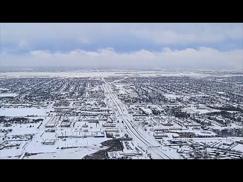 Video Thumbnail: Drone footage shows snow-covered US cities, snow plows at work