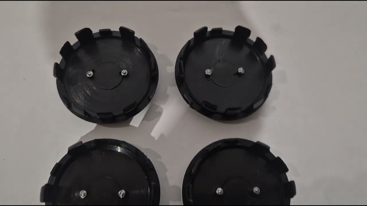 Nissan Středové krytky kol 54/47 mm (sada 4 ks) Video 5