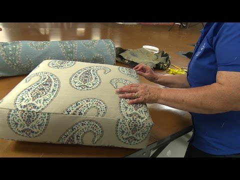 Part of a video titled How to Recover a Cushion on a Recliner - YouTube