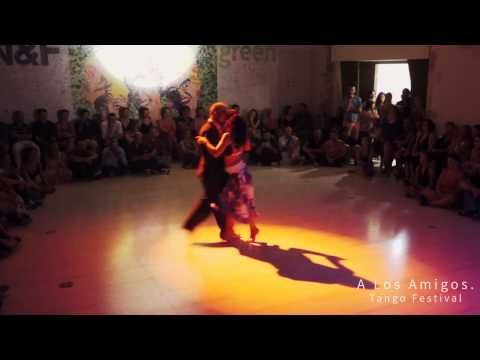  Michalis Souvleris  and  Maria Kalogera  are  dancing  to  "  Viejo Portón  "  by  Rodolfo Biagi  at  A los amigos tango festival  in  2015
