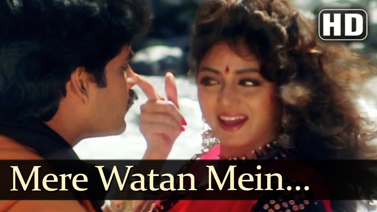 Mere Vatan Mein Maine Lyrics | Khuda Gawah | Amitabh Bachchan, Sridevi | Alka Yagnik, Suresh Wadkar | Laxmikant Shantaram Kudalkar (Laxmikant Pyarelal), Pyarelal Ramprasad Sharma (Laxmikant Pyarelal)