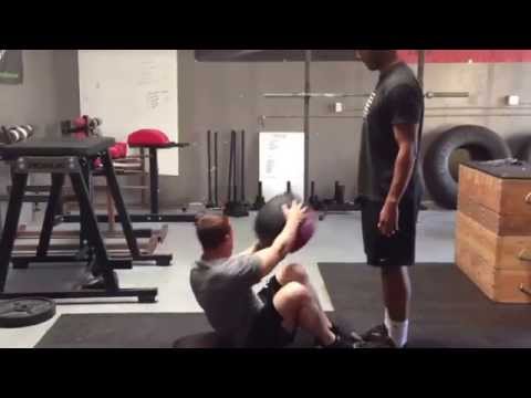 Med Ball Sit-ups with a Twist