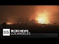 Homes and buildings continue to burn along Pacific Coast Highway.mp4