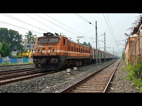 HWH WAP4 leading heavily late running HOWRAH RAJDHANI EXPRESS hitting 130kmph at Dankuni Jn.