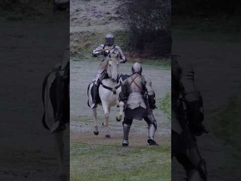 Getting hit by a lance.