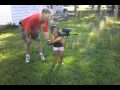 Emily Target Shooting With A Paintball Gun