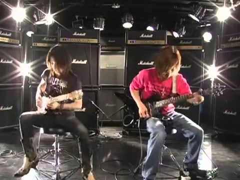 Takayoshi Ohmura vs Syu - Guitar Battle