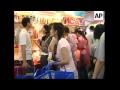 Beijing Mementos Snapped Up As Olympic Crowds Grow